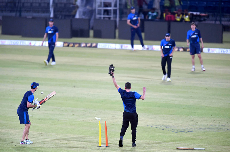 New Zealand's cricketers during a practice session at the Qaddafi Cricket Stadium ahead of the fourth Twenty20 Cricket match between Pakistan and New Zealand Cricket Teams in a five-match Twenty20 series