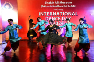 Artist performing dance on stage during the International Dance day program organized by Lahore Arts Council Alhamra and Shakir Ali Museum (Pakistan National Council of Arts) at Al-Hamra.