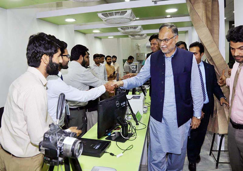 Minister Ahsan Iqbal is being briefed by officials of NADRA Centre in Zafarwal, Punjab regarding the progress of the new center. It will soon be opened for public as a one-stop solution for their identity needs