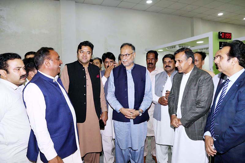 Minister Ahsan Iqbal is being briefed by officials of NADRA Centre in Zafarwal, Punjab regarding the progress of the new center. It will soon be opened for public as a one-stop solution for their identity needs