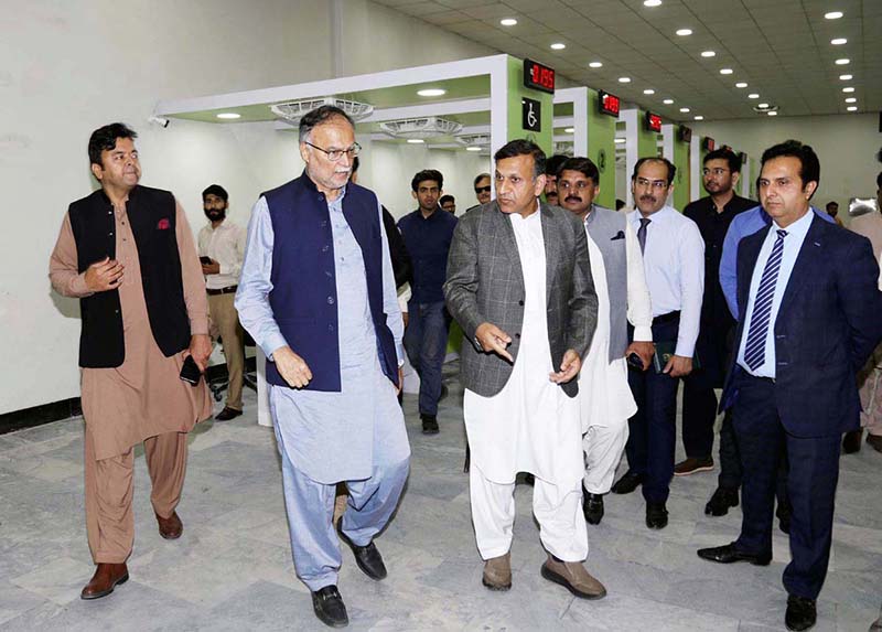 Minister Ahsan Iqbal is being briefed by officials of NADRA Centre in Zafarwal, Punjab regarding the progress of the new center. It will soon be opened for public as a one-stop solution for their identity needs