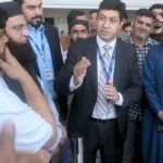 Hussain Muhammad, Consul General along with his team meet stranded Pakistani passengers at Dubai International Airport.