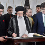 President of the Islamic Republic of Iran, Dr. Seyyed Ebrahim Raisi recording his remarks in the visitor book.