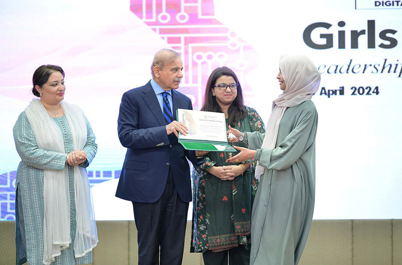 Prime Minister Muhammad Shehbaz Sharif distributing certificates of appreciation among the high achiever women and girls in the field of IT