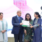 Prime Minister Muhammad Shehbaz Sharif distributing certificates of appreciation among the high achiever women and girls in the field of IT