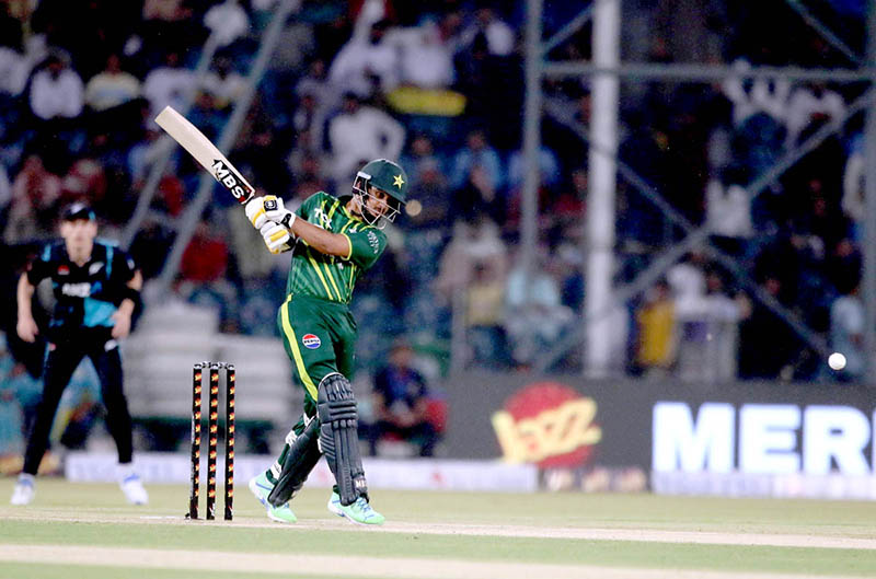 New Zealand players celebrate the wicket of Pakistan batter Usman Khan (caught by Duffy balled by Sears) during the Fourth Twenty20 International Cricket Match between Pakistan and New Zealand at the Qaddafi Cricket Stadium