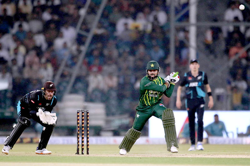 New Zealand players celebrate the wicket of Pakistan batter Usman Khan (caught by Duffy balled by Sears) during the Fourth Twenty20 International Cricket Match between Pakistan and New Zealand at the Qaddafi Cricket Stadium