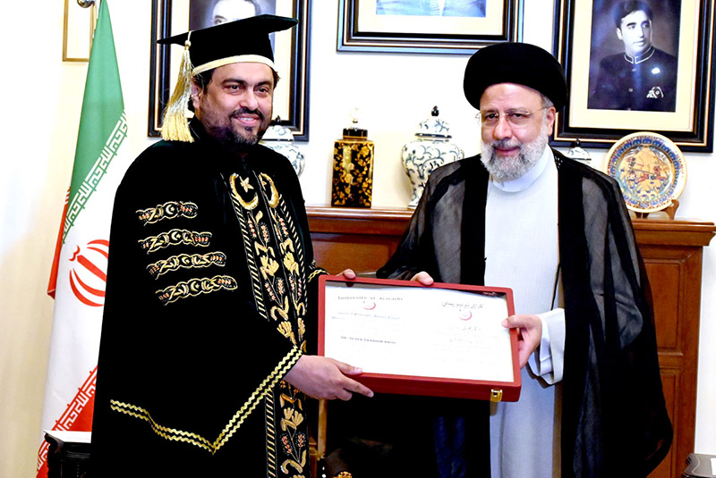 Iranian President, Dr. Seyed Ebrahim Raisi is being conferred a degree by Governor Sindh Kamran Khan Tessori.