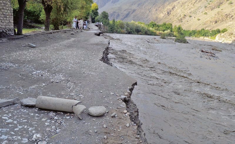 Flood water swept away roads in Chitral due to heavy rains
