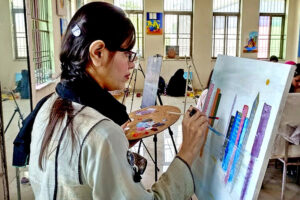 Students participating in Arts and Painting Competition organized by Qasr Behbood Social Welfare and Baitul Mal Department, The Formanite School System.