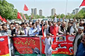 Former Prime Minister Raja Pervaiz Ashraf addressing during function to mark the International Labour Day at National Press Club.