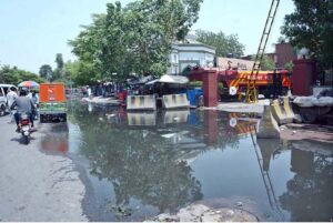 A view of sewerage water accumulated in front of rescue office in GTS Chowk creating problems for motorists and pedestrian and needs the attention of concerned authorities.