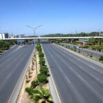 A deserted view of Sri Nagar Highway due to extreme heat wave in Federal Capital