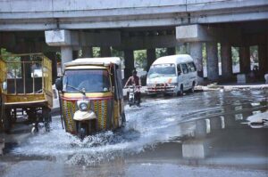 Vehicles passing through sewerage water accumulated at GTS underpass and needs attention of the concerned authorities.