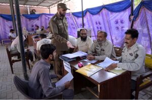 DSP Patrolling Police Rana Ghulam Mujtaba is inspecting the various desks set up for police recruitment at Regional Office Patrolling Police