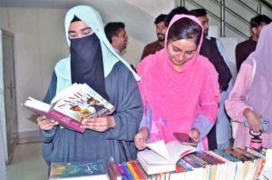 Students visiting book stalls during two-day Mega Library Book Festival at MNS Agriculture University.