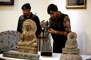 Police personnel’s showing recovered artifacts to a media here at Police Line.