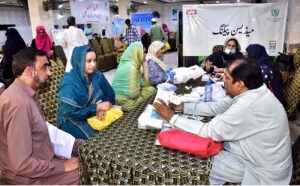 Hajj pilgrims are being given vaccinations and necessary supplies at Haji Camp