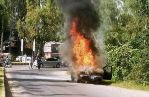 A view of car engulfed in flames after a fire erupts at H-9 in the Federal Capital.