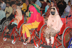 Persons with disability participate in the wheelchair ceremony organized by the Society for the Special Persons and the Church of Jesus Christ of Latter-day Saints at the local hall
