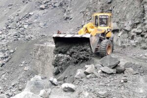 Workers of Gilgit-Baltistan Disaster Management Authority and GBPWD busy in clearing blocked road of Astore after heavy rain and land sliding in the area.