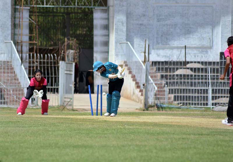 Players in action during cricket match played between Karachi Women and Lahore Women cricket teams during National Women's One Day Cricket Tournament 2024 at Iqbal Stadium.