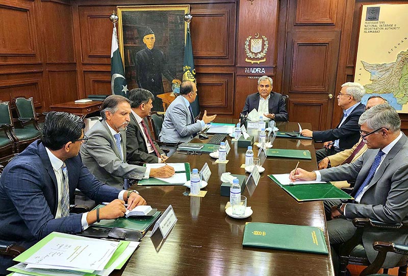 Federal Minister for Interior Mohsin Naqvi chairing a meeting at NADRA headquarters.