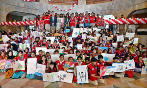 Students participating in Arts & Painting Competition under the theme "Keeping Humanity Alive" in connection with World Red Cross and Red Crescent Week Celebration at Citizen's Club, F-9 Park.