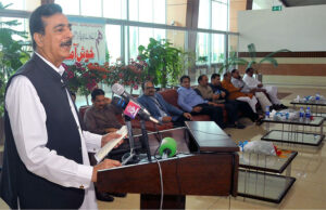 Chairman Senate Syed Yusuf Raza Gilani addressing the ceremony during the departure of intended pilgrims on the first Hajj flight from Multan International Airport.