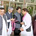 Provincial Minister for Local Government Zeeshan Rafique seen off indenting pilgrims during first flight of Hajj Operation at Sialkot Airport