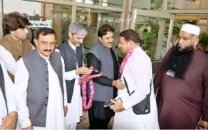 Provincial Minister for Local Government Zeeshan Rafique seen off indenting pilgrims during first flight of Hajj Operation at Sialkot Airport