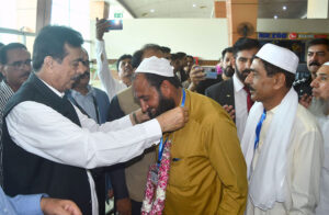 Chairman Senate Syed Yusuf Raza Gilani addressing the ceremony during the departure of intended pilgrims on the first Hajj flight from Multan International Airport.