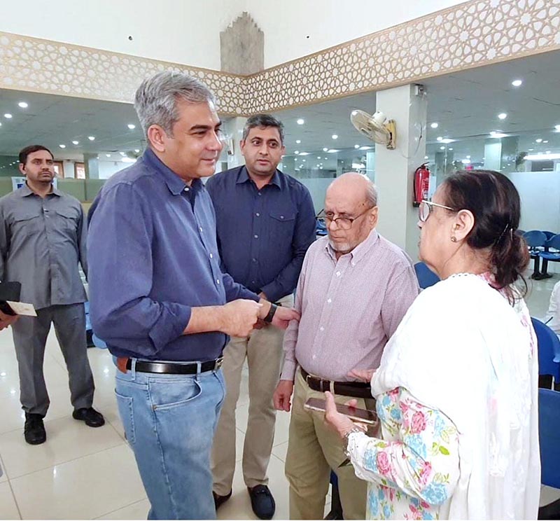 Interior Minister Mohsin Naqvi visiting NADRA Center, Garden Town