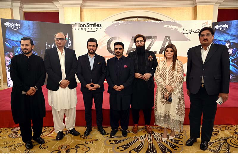 Chief Guest Asif Sumsum, Chairman ABAD, former chairman ABAD Faiyaz Ilyas, Foundation Chairman Zeeshan Afzal, Shoeib Khan and Nourin Khan with other guests in a group photograph during Millions Smiles Foundation arranges a Fundraising Dinner for Gaza Relief at a local hotel