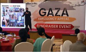 Chief Guest Asif Sumsum, Chairman ABAD, former chairman ABAD Faiyaz Ilyas, Foundation Chairman Zeeshan Afzal, Shoeib Khan and Nourin Khan with other guests in a group photograph during Millions Smiles Foundation arranges a Fundraising Dinner for Gaza Relief at a local hotel