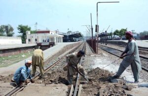 Railway workers are busy in repairing railway tracks near Railway Station during repairing and maintenance work.