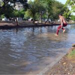 Youngster jumping into the canal to get relief from hot and humid weather in the Provincial Capital.