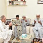 President Asif Ali Zardari offering Fateha during his visit to the family home of Shaheed Major Babar Khan