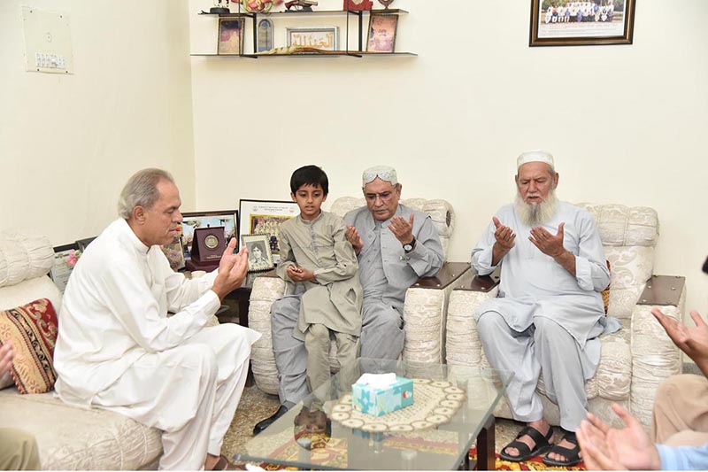 President Asif Ali Zardari offering Fateha during his visit to the family home of Shaheed Major Babar Khan