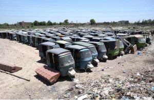 A large number of auto rickshaws seized during crackdown against smoke emitting rickshaws by traffic police.