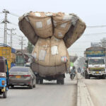 A view of truck heavily loaded with chaff (husk from wheat) on the way at SITE area Road