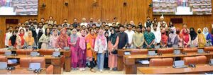 A group photograph of students of Government College University, Faisalabad in the Senate Hall at Parliament House.