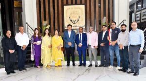 A group photograph of Secretary Labor and Human Resources Punjab Naeem Ghous along with, SVP SCCI Wahab Jahangir and others at Chamber of Commerce and Industry.
