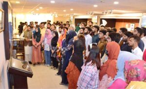 A group photograph of students of Government College University, Faisalabad in the Senate Hall at Parliament House.