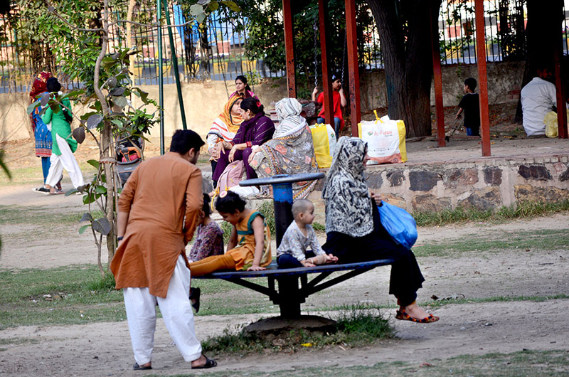 A family enjoy their day at Bagh Jinnah