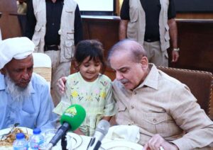 Prime Minister Muhammad Shehbaz Sharif interacting with families of labourers at a luncheon he hosted in their honour on the occasion of Labour Day.