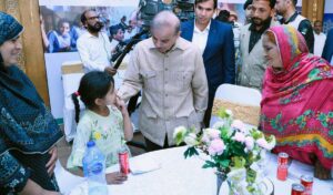 Prime Minister Muhammad Shehbaz Sharif interacting with families of labourers at a luncheon he hosted in their honour on the occasion of Labour Day.