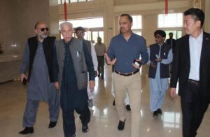 Chairman Gwadar Port Padand Khan briefing Federal Minister for Maritime Affairs Qaiser Ahmed Sheikh, about Gwadar port.