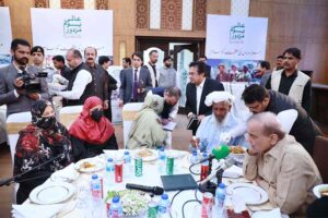 Prime Minister Muhammad Shehbaz Sharif interacting with families of labourers at a luncheon he hosted in their honour on the occasion of Labour Day.