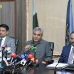 Interior Minister Mohsin Naqvi addressing a press conference at FIA office